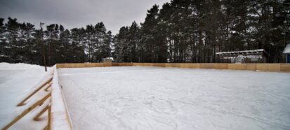 Image shows outdoor rink in the winter months.