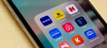 Cell phone with short-term rental apps on screen
